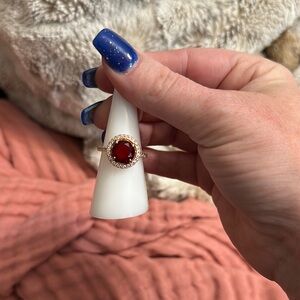 Bomb party size 7 - rose gold , red gemstone